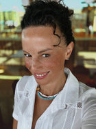 Bébé Duo worn layered — Biwa pearls and turquoise locked together with signature closure
