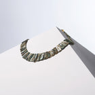 Queen Paua necklace of Paua sea shell segments with white sapphires on a white block