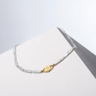 Hand-knotted Biwa freshwater pearl necklace with Bébé Lock closure — House of Sól Bébé Blanc
