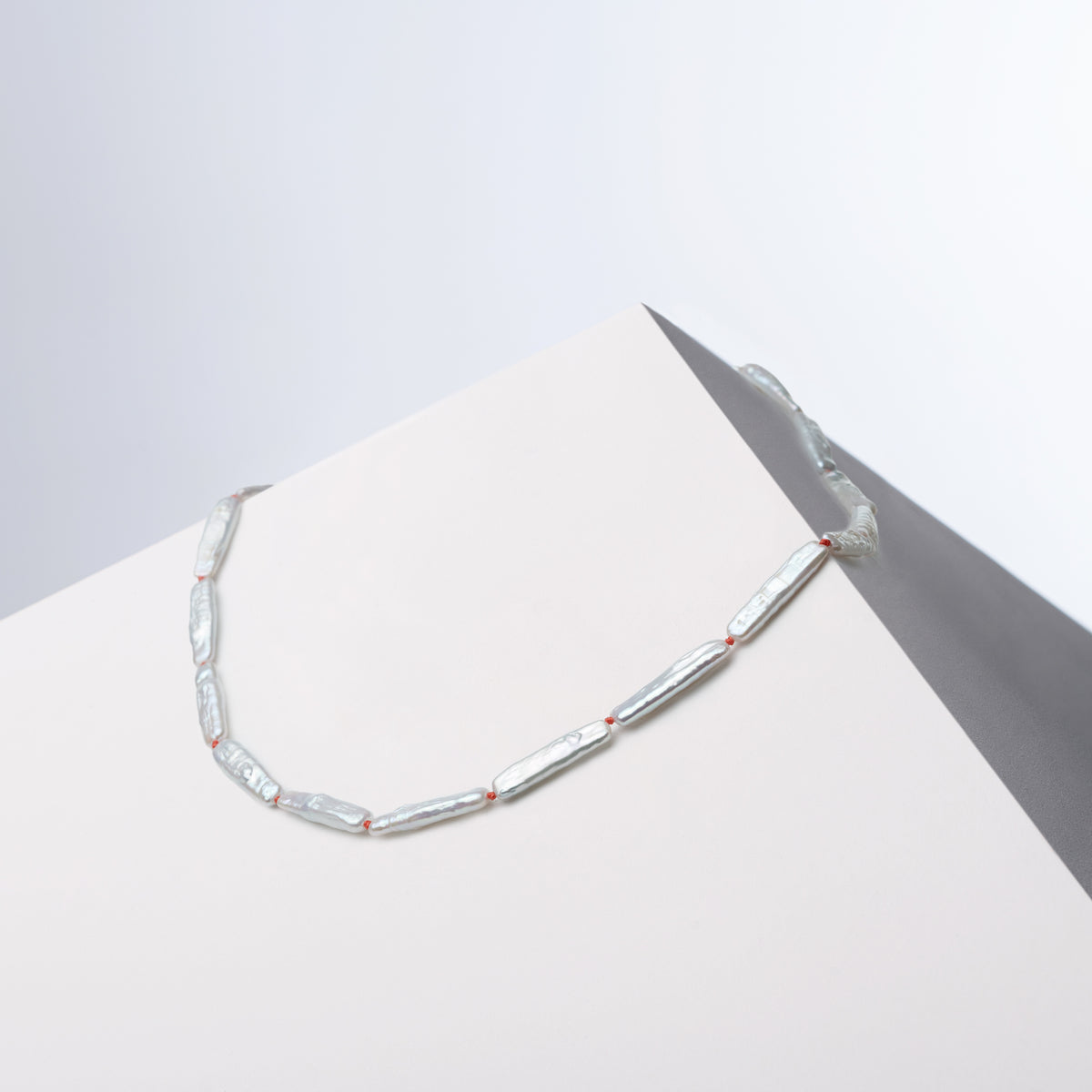 Bébé Blanc 17-inch Biwa pearl row with silk-knotted construction by House of Sól