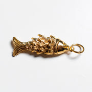 Close-up of the Golden Horn fish charm in gold-filled sterling silver with textured scales and jump ring